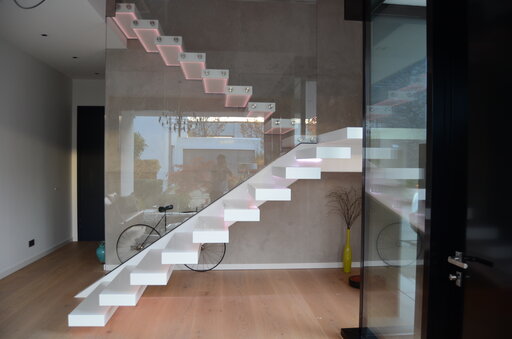 Corian LED – Floating cantilever staircase with integrated lighting design