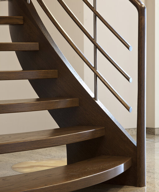 Amsterdam – Curved wooden staircase with flowing, organic lines